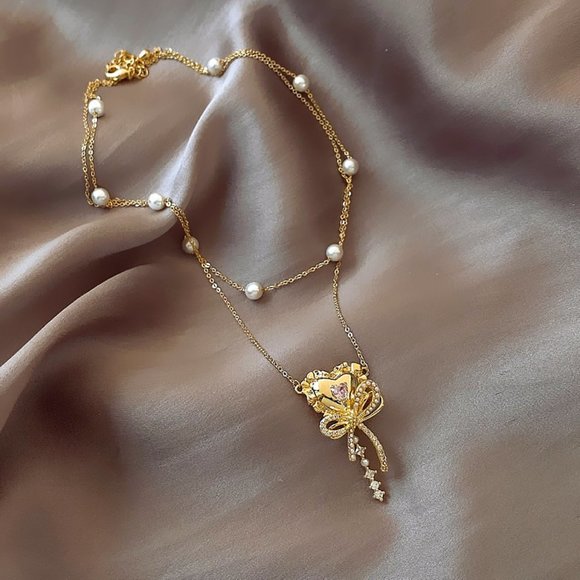 GOLICC Pearl Bow Necklace - Picture 6 of 8